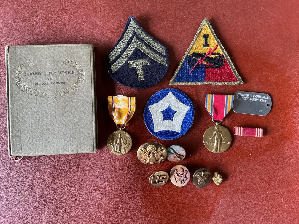 World War II Military Medal and Insignia Collection with Service Book