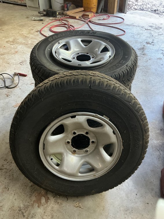 Four Matching Tires and Wheels with Partial Wear