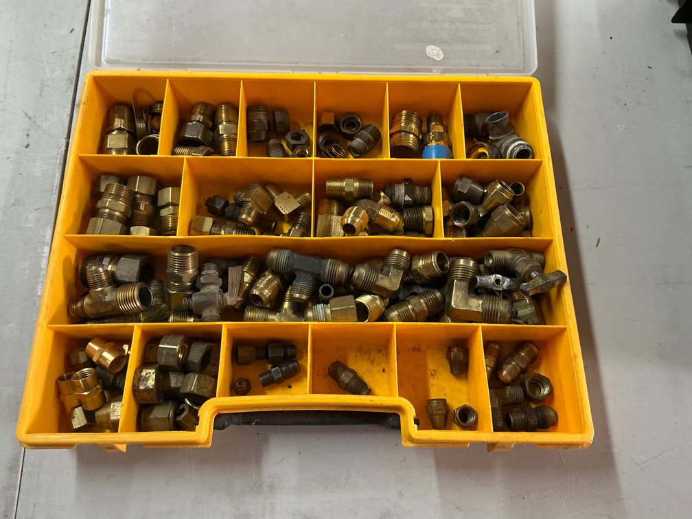 Organized Set of Brass and Steel Hydraulic Fittings in Plastic Carrying Case