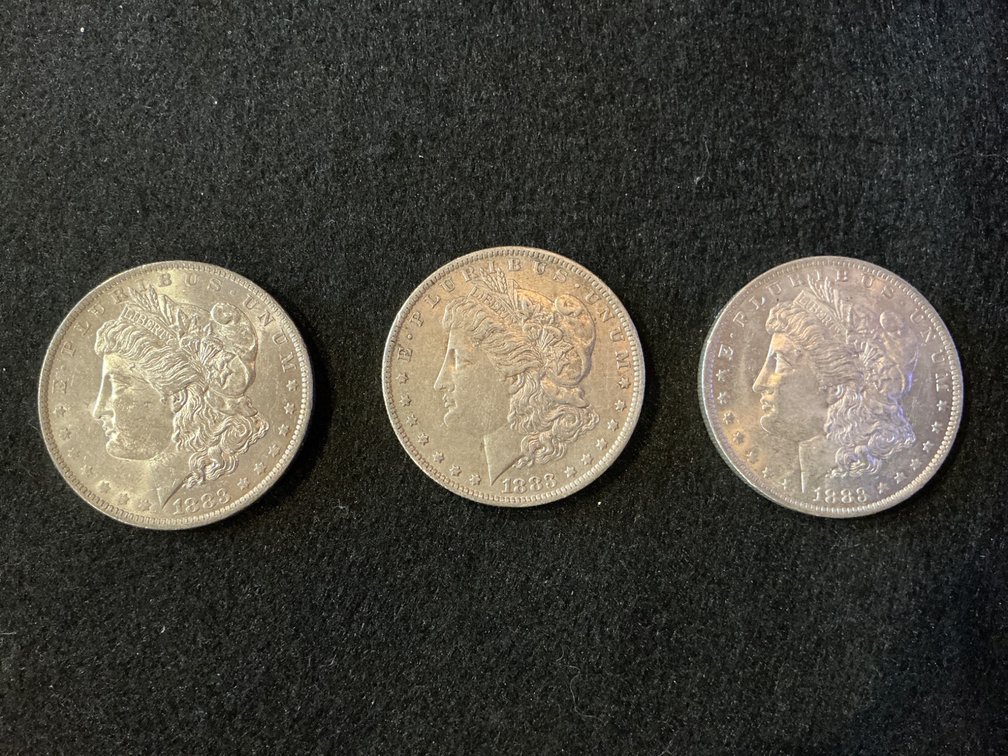 Three 1883 Morgan Silver Dollars with O Mint Mark