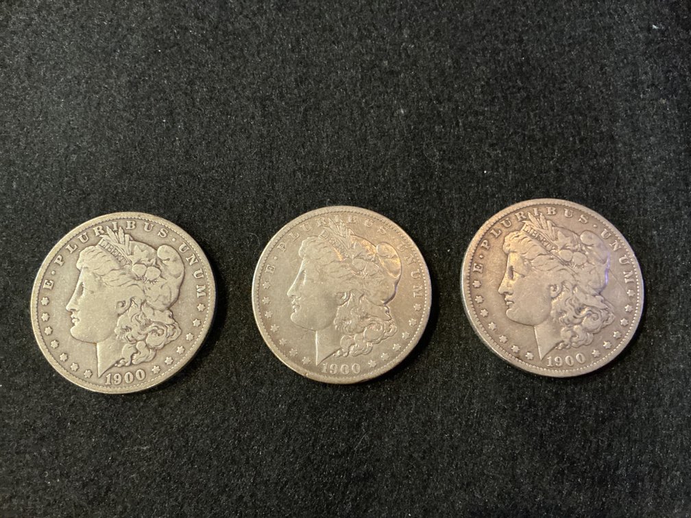 Three 1900-O Morgan Silver Dollars