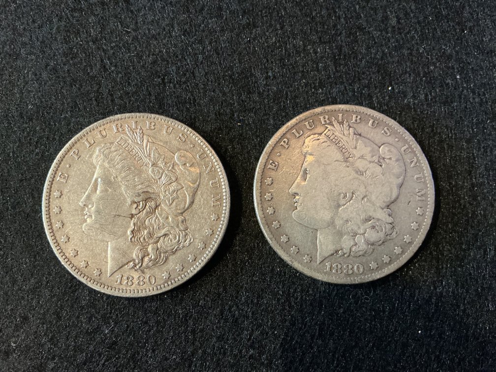Two 1880 Morgan Silver Dollars with ‘O’ and Blank Mint Marks