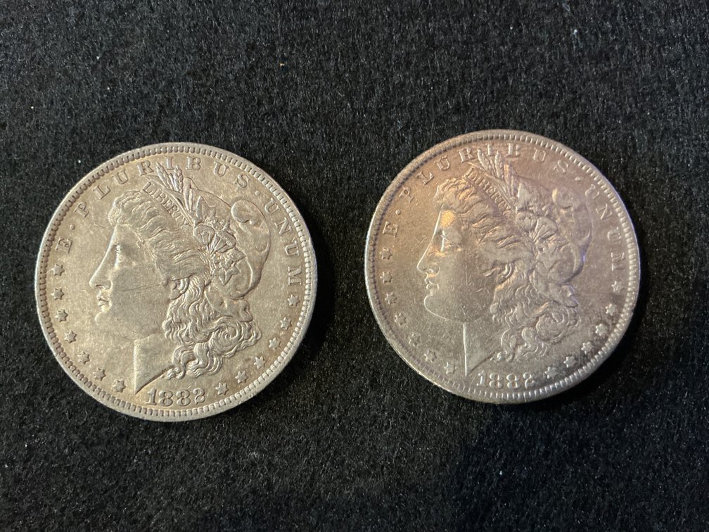 Two 1882 Morgan Silver Dollars with New Orleans Mint Mark (O)