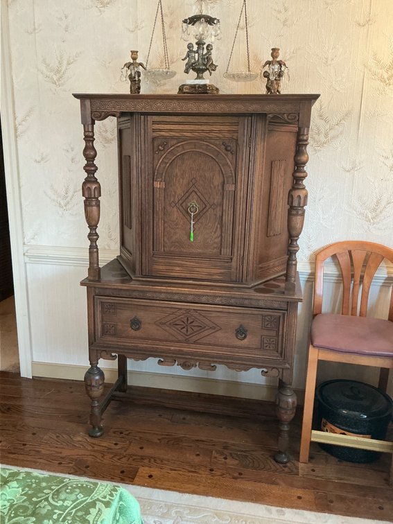 Turned Oak Cabinet on Stand with Drawer and Carved Details