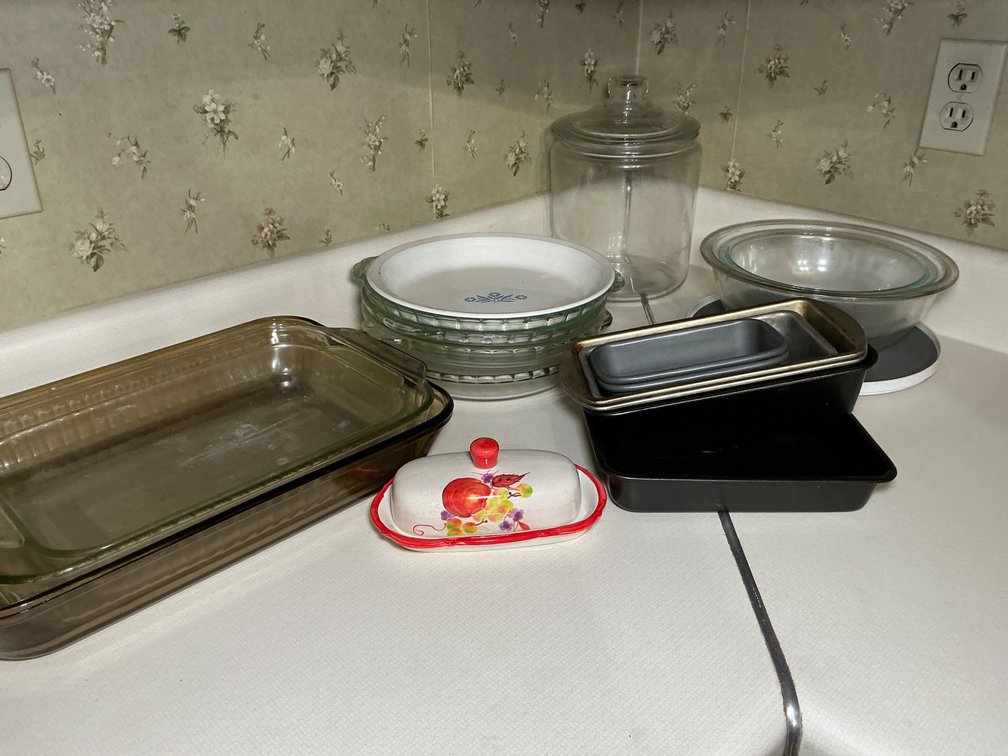 Assorted Bakeware and Cookware Set Featuring Glass, Metal, and Ceramic Pieces