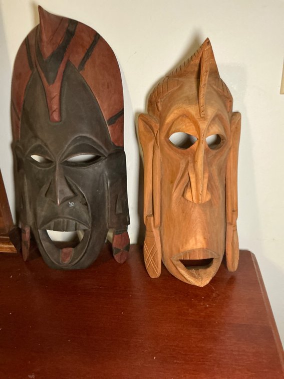 Pair of Hand-Carved Wooden Masks, Including One 15-Inch Mask
