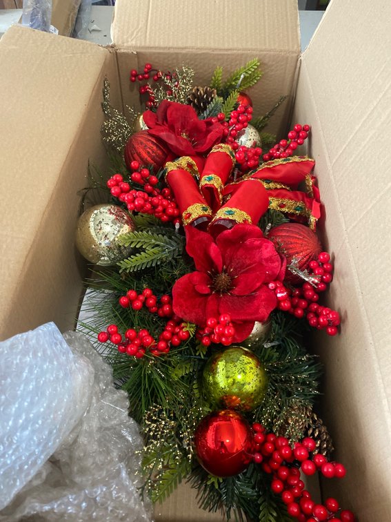 Decorative Holiday Floral and Ornament Arrangements