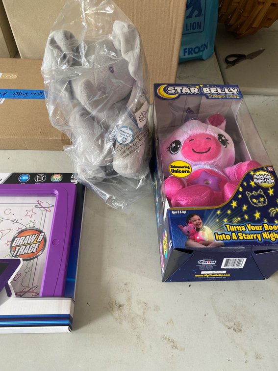 Children’s Toys Including Plush Elephant, Star Belly Dream Lites, and Glow Pad