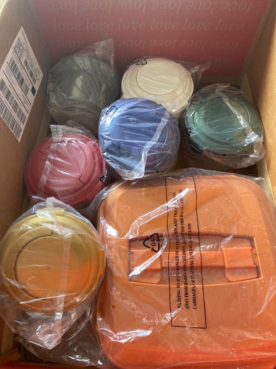 Multi-Colored Plastic Food Storage Containers with Lids