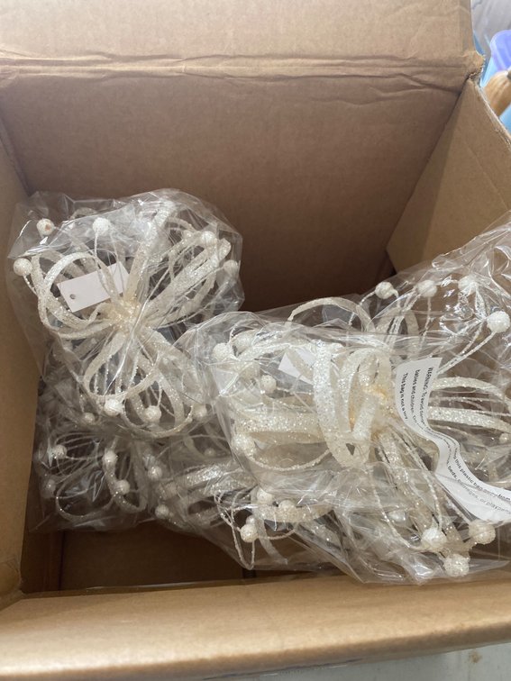 Boxed Lot Including Ribbon Embellishments, Decorative Birds, and Glittered Pinecones