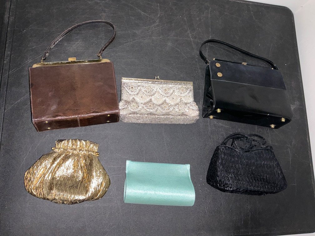 Six Clutch Purses Featuring Various Brands and Styles
