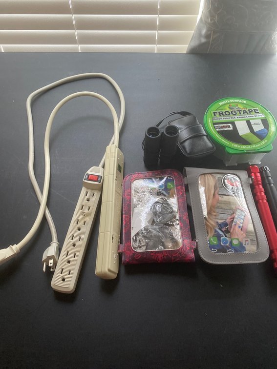 Household Items with Power Strip, Tape, Flashlight, and More