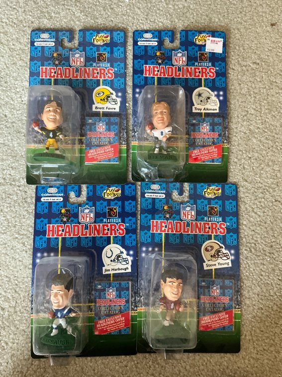 NFL Headliners Brett Favre, Troy Aikman, Jim Harbaugh, and Steve Young Figures
