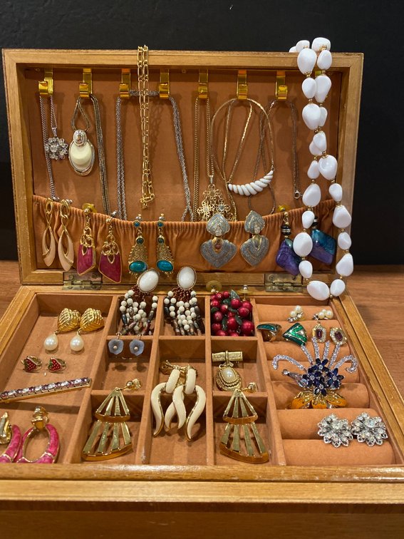 Jewelry Box With Assorted Necklaces, Earrings, and Brooches