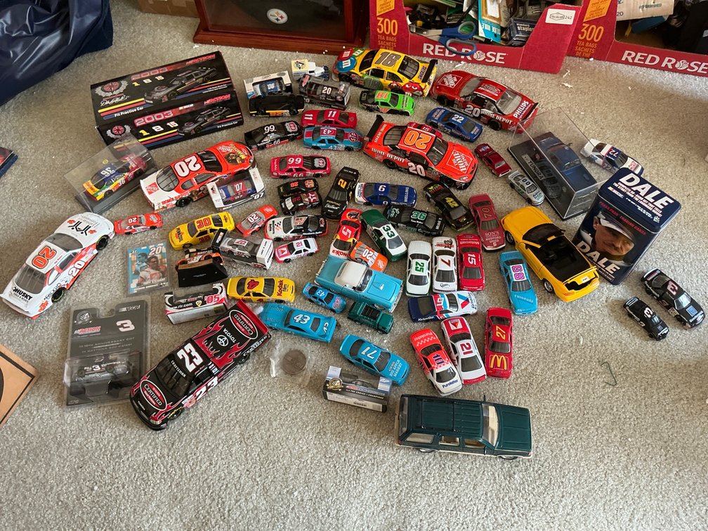 Small, Medium, and Large Nascar Toy Cars with Memorabilia