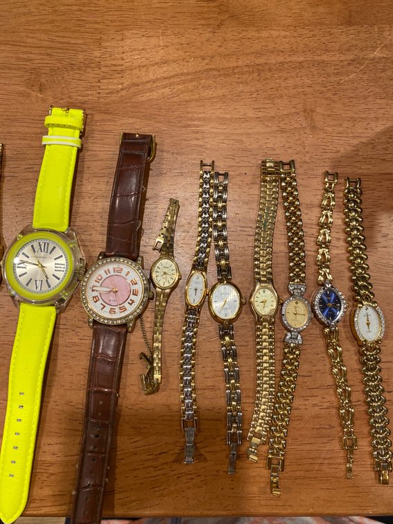 10 Assorted Ladies’ Watches with Metal and Leather Straps