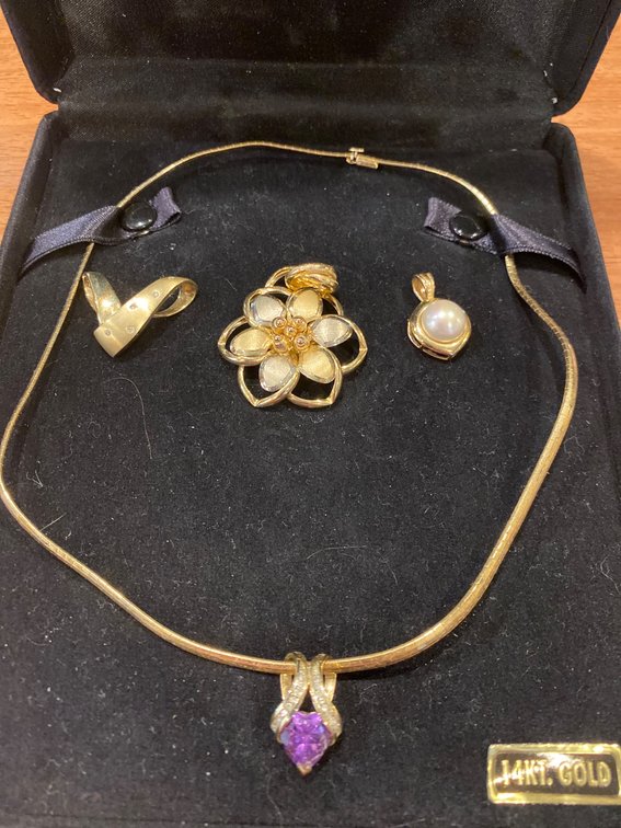 14Kt Gold Jewelry Set Featuring Necklace and Assorted Charms, Total Weight 30 Grams