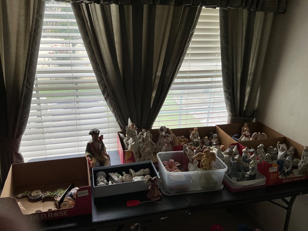 Figurines Featuring Angelic, Nautical, and Cultural Themes