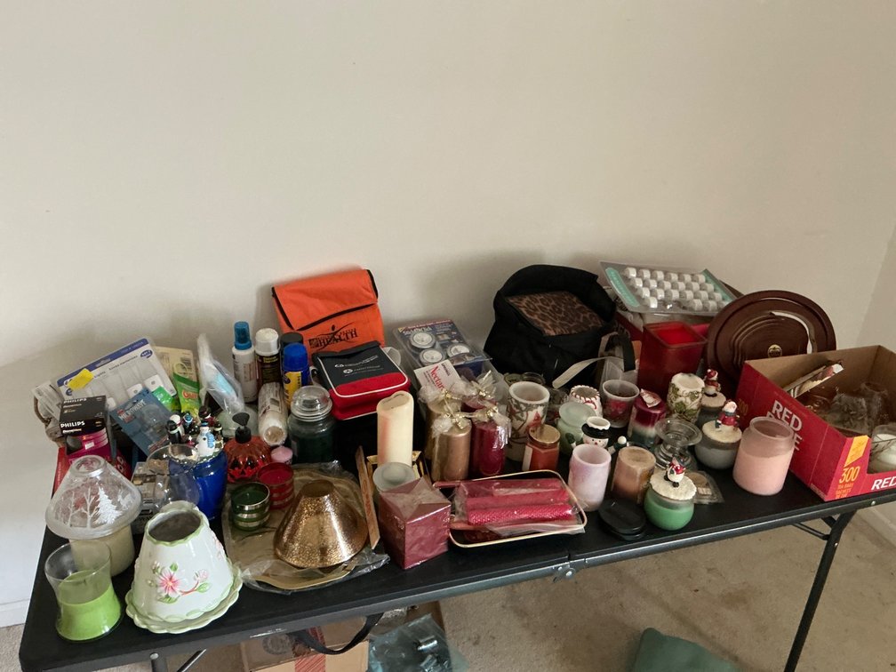 Closet Contents Including Candles, Lights, Lunch Bags, and Miscellaneous Items