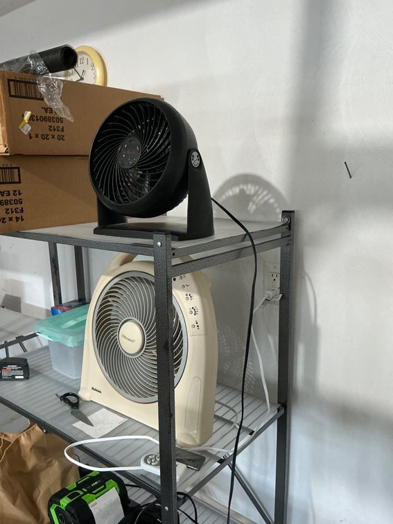 Two Portable Electric Fans with Compact Designs
