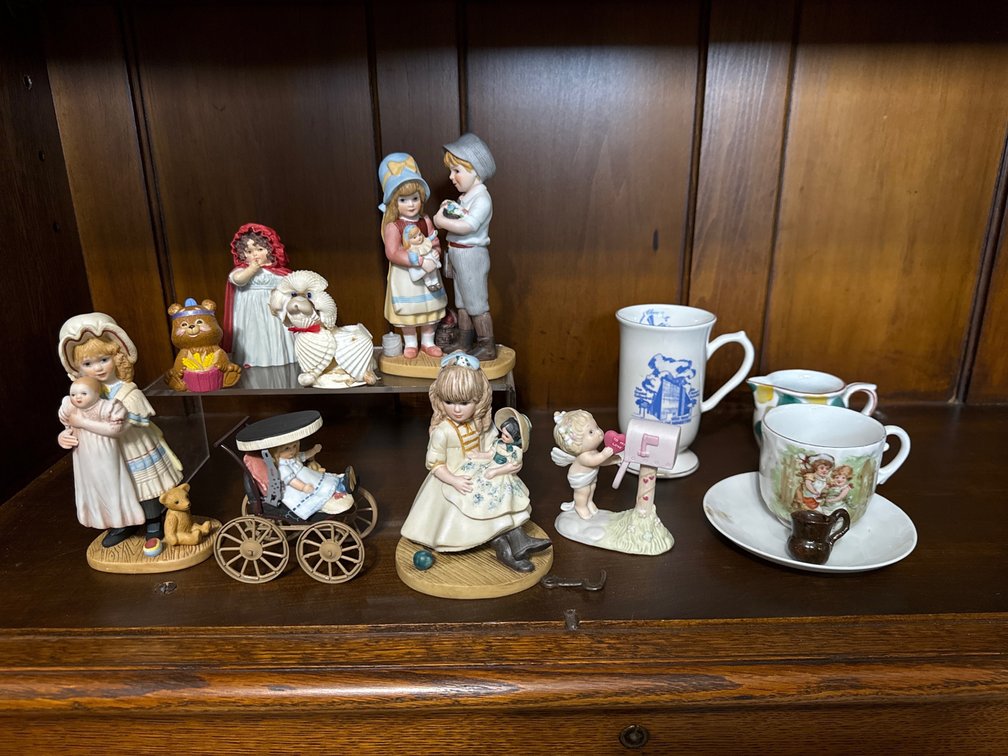 Figurines and Tea Cup