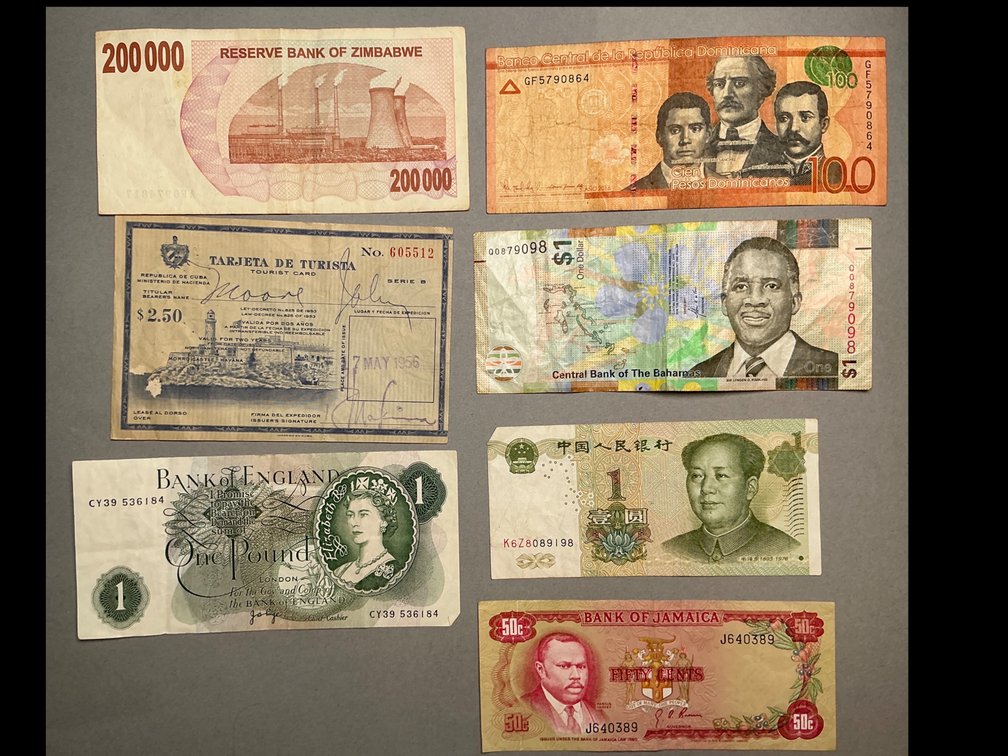 Foreign Currency Assortment and Cuban Tourist Visa