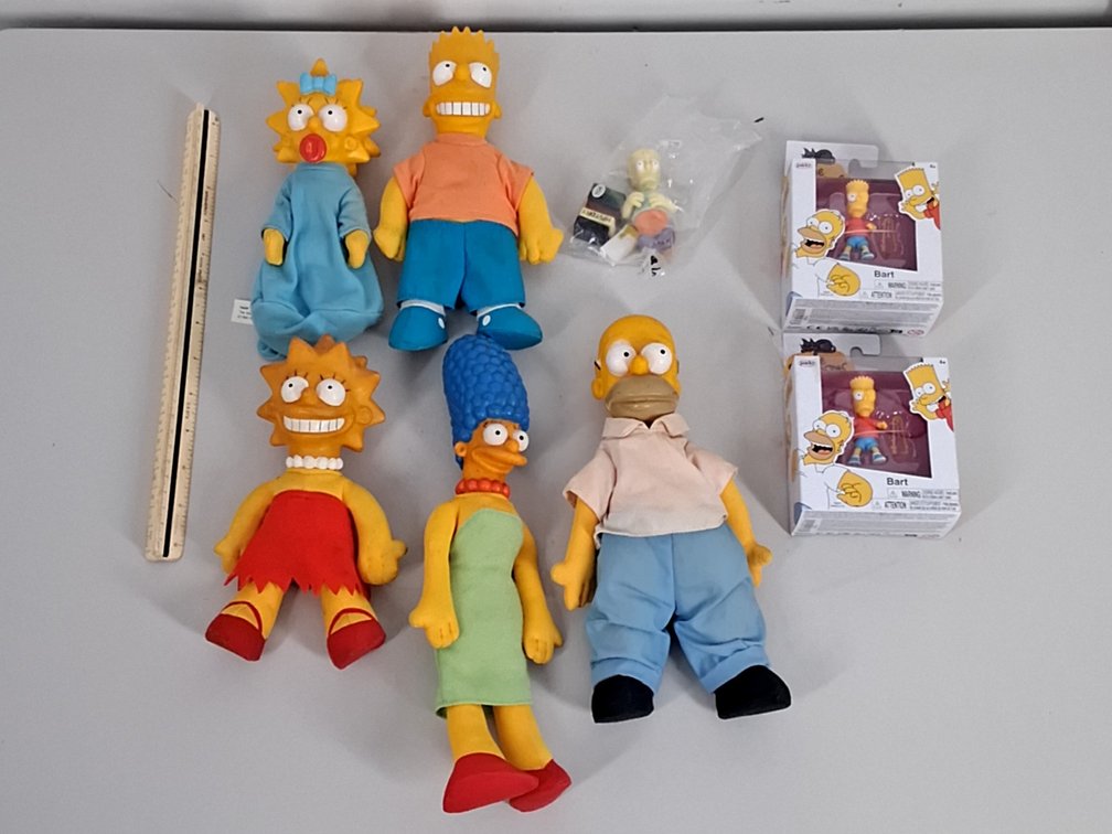 3 The Simpsons action figures and 5 stuffies