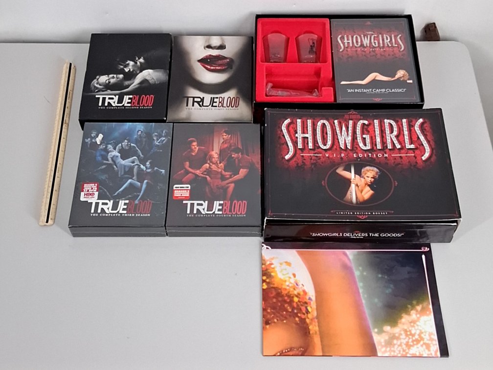 seasons 1-4 of True Blood DVDs and a Showgirls