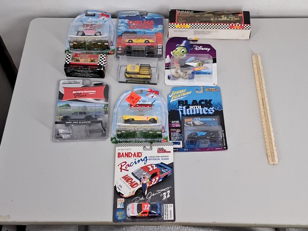 10 toy cars in packaging incl. Disney, Greenlight