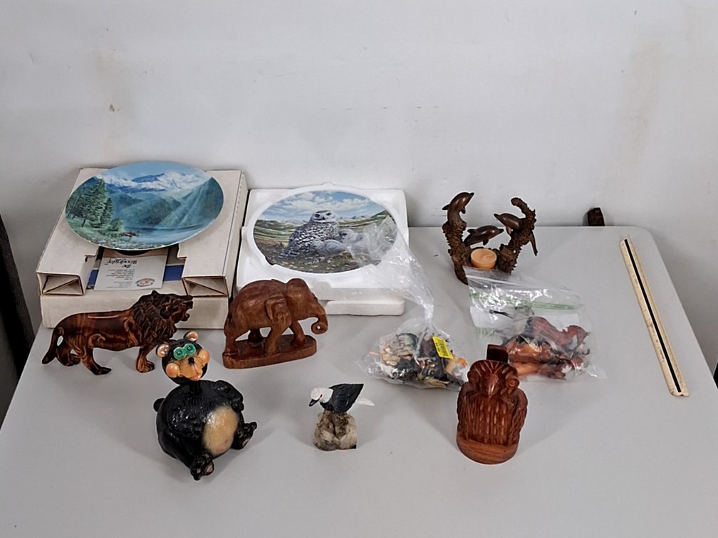 lot of home decor figurines and 2 decorative