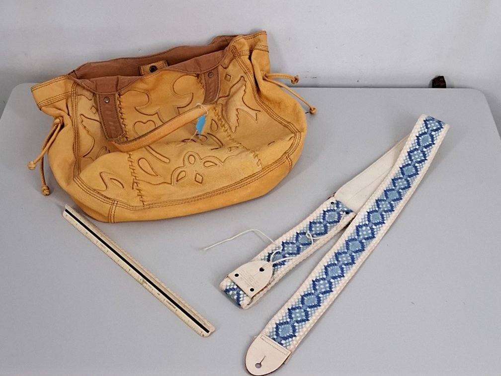 women's Lucky Brand yellow purse and a Bobby