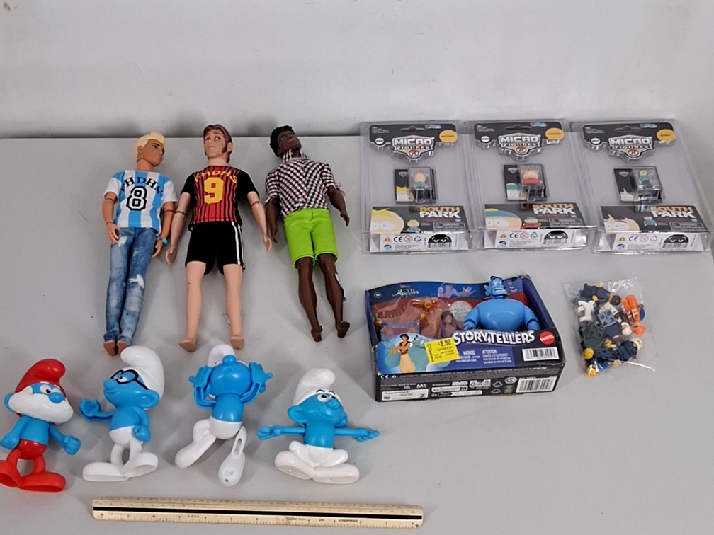 lot of action figures and dolls incl. The Smurfs,