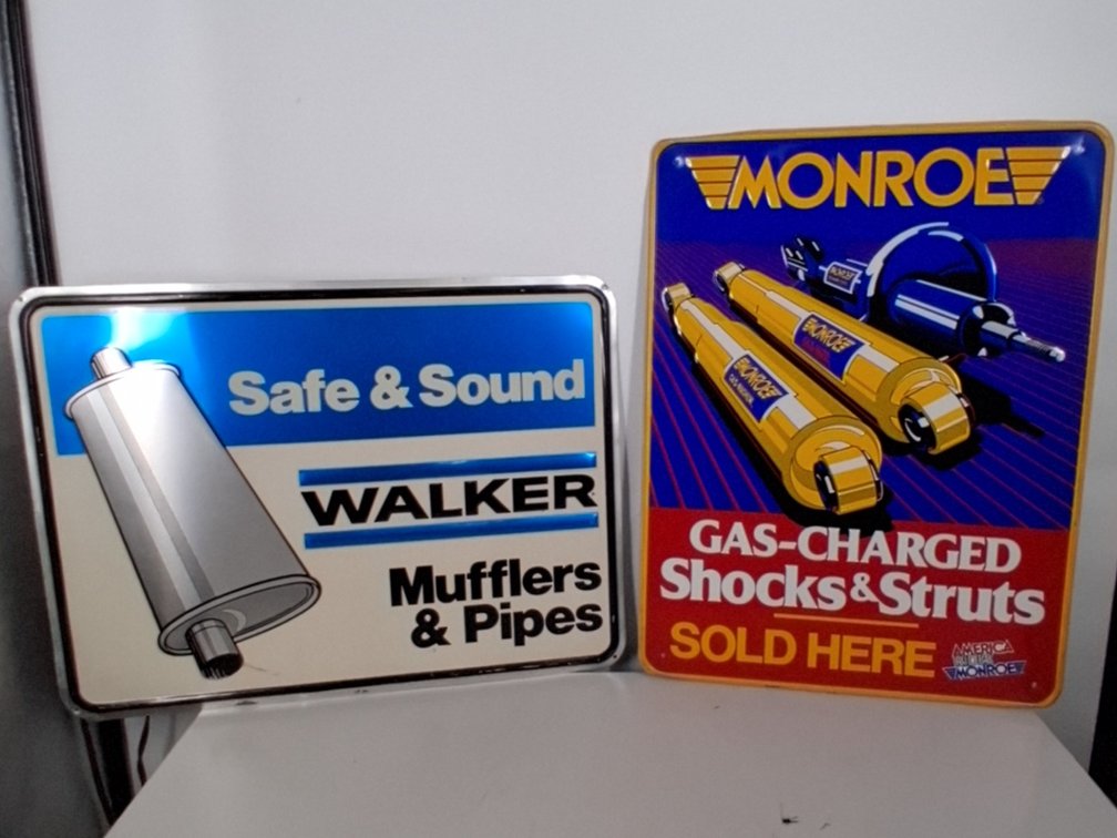 2 tin signs incl. Walker Mufflers & Pipes