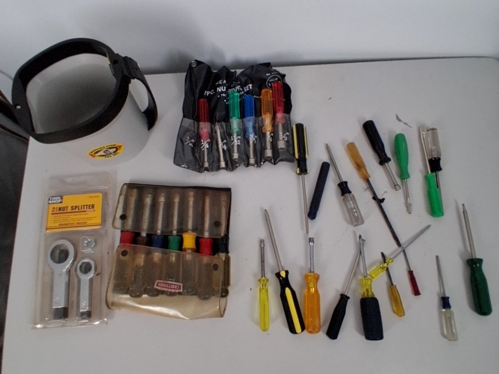 lot of nut driver sets, screwdrivers,