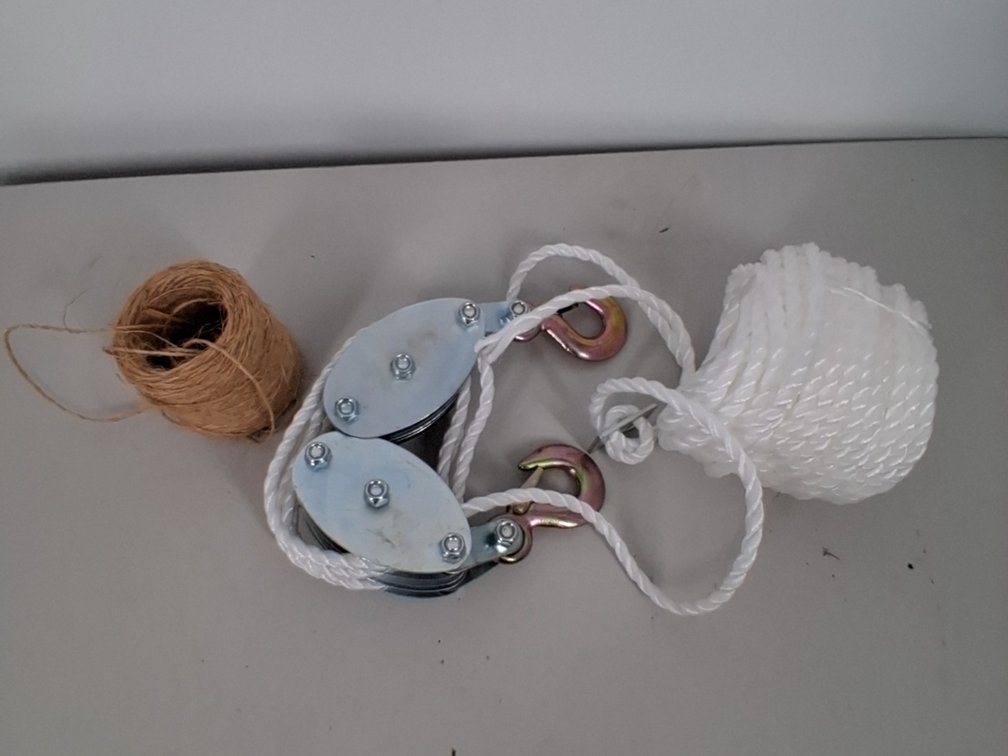 new in package pully system and some twine