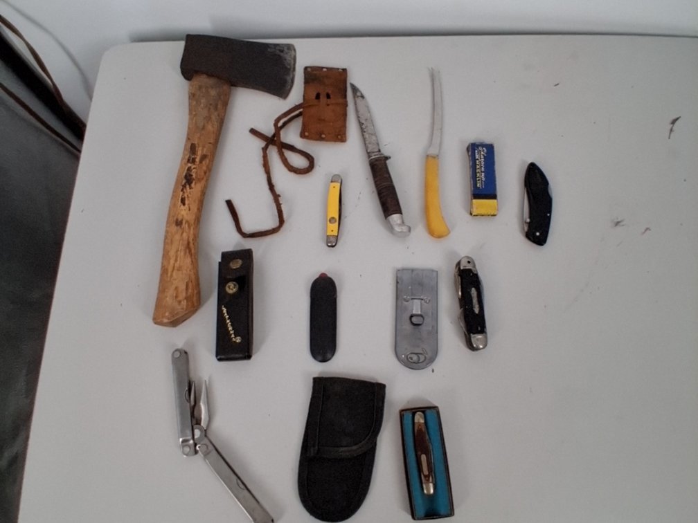 lot of hatchet, pocket knives, fillet knife