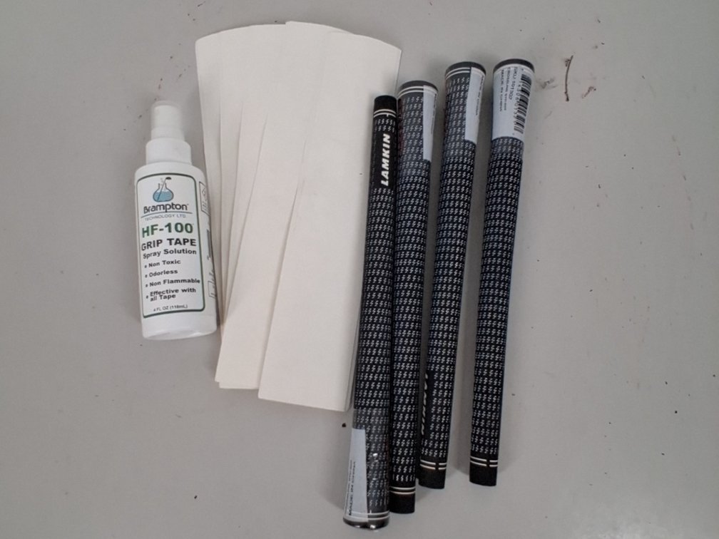 lot of golf grip tape and 4 Lamkin