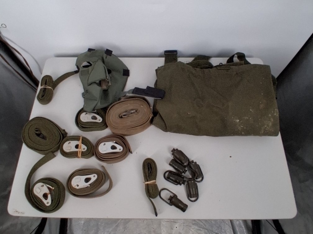 lot of military duffle, military tent line