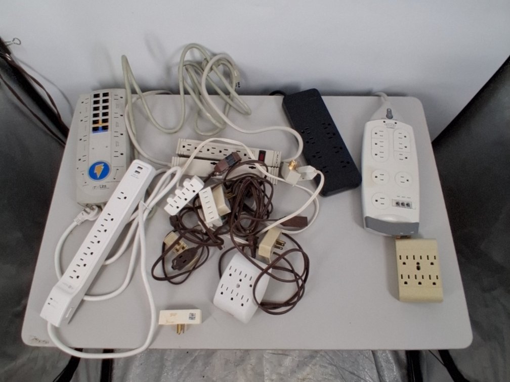 6 surge protectors and outlet adaptors