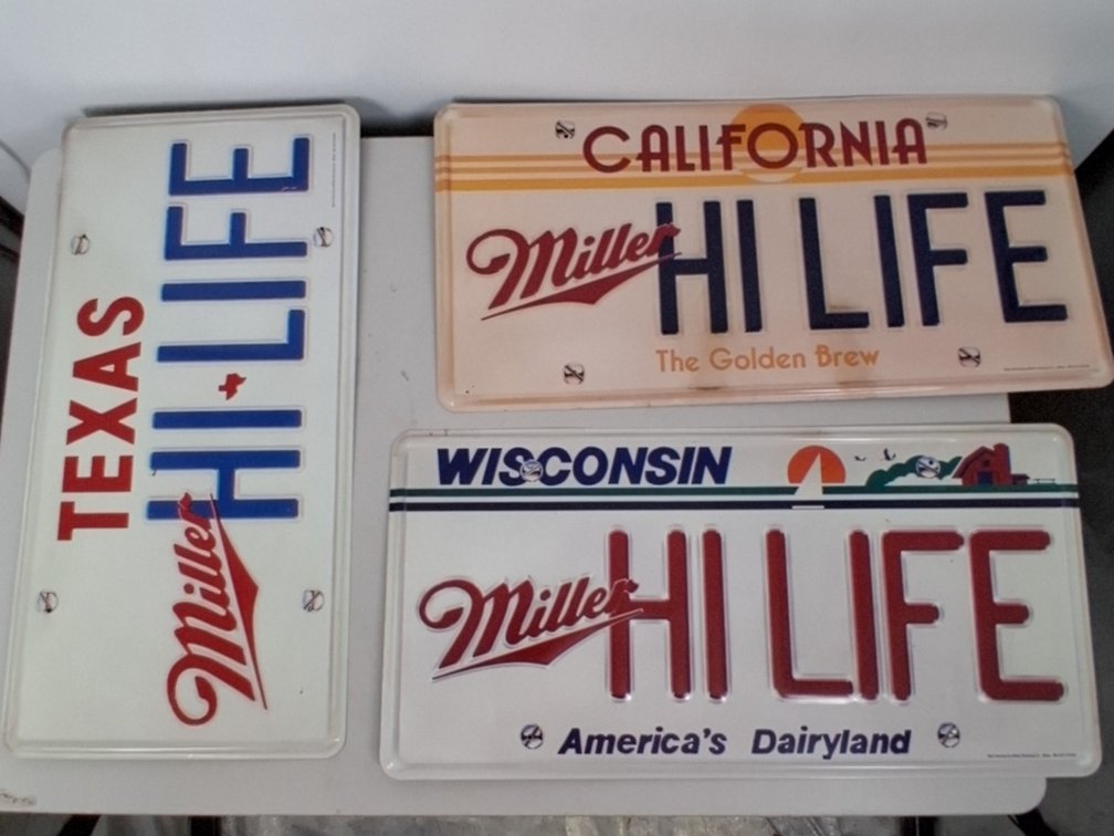 3 license plate tin signs incl.