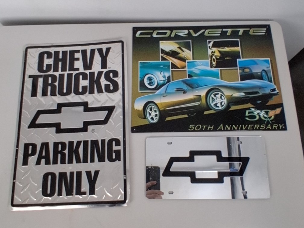 2 tin signs incl. Chevy Trucks Parking Only