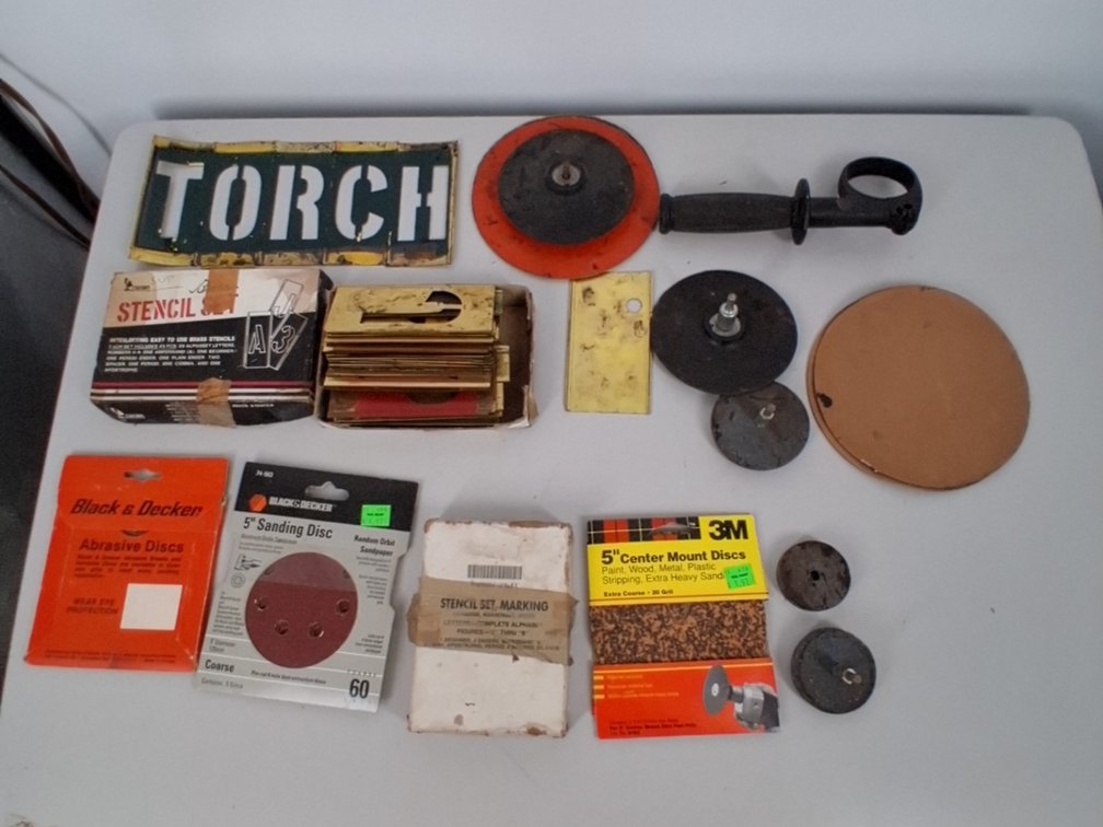 lot of stencils, sanding discs, grinding