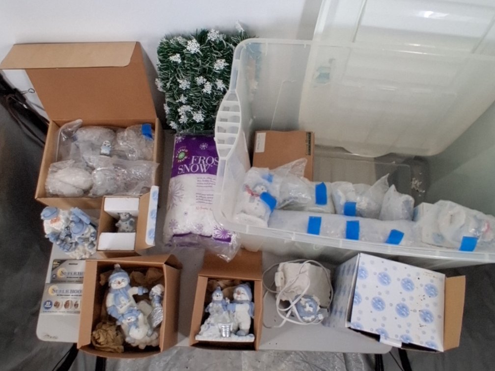 18 gal tote of winter decor incl.