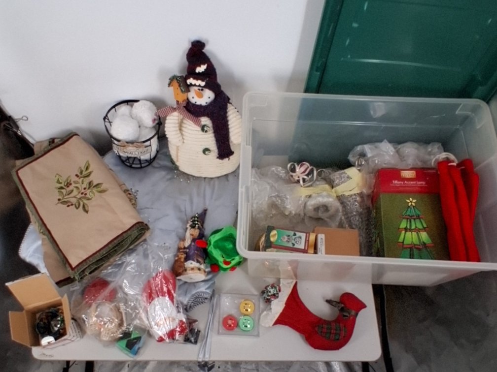14 gal tote of Christmas decor incl.
