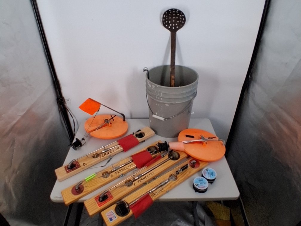 lot of ice fishing items incl. ice scoop