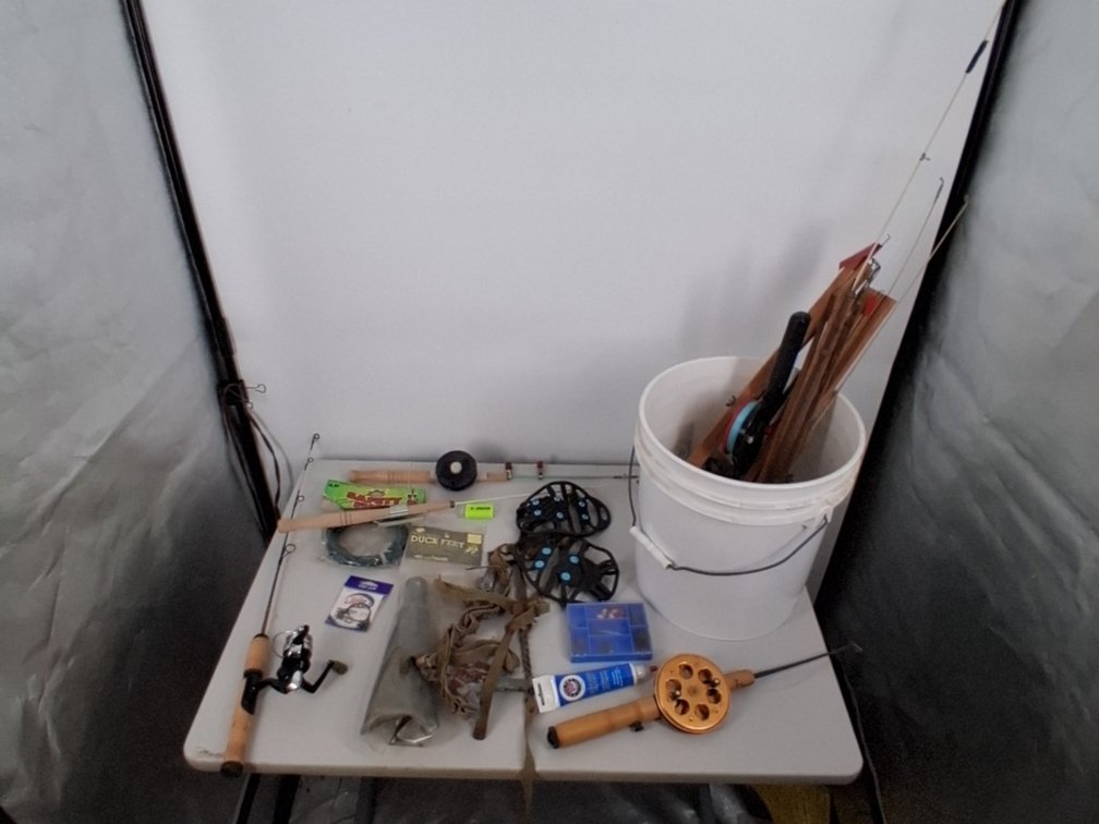 lot of fishing items incl. jig poles,