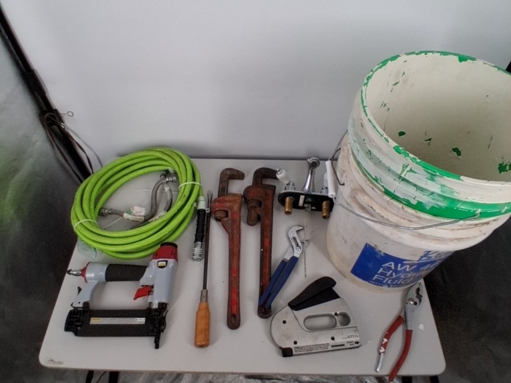 lot of air hose, 2 pipe wrenches-18",