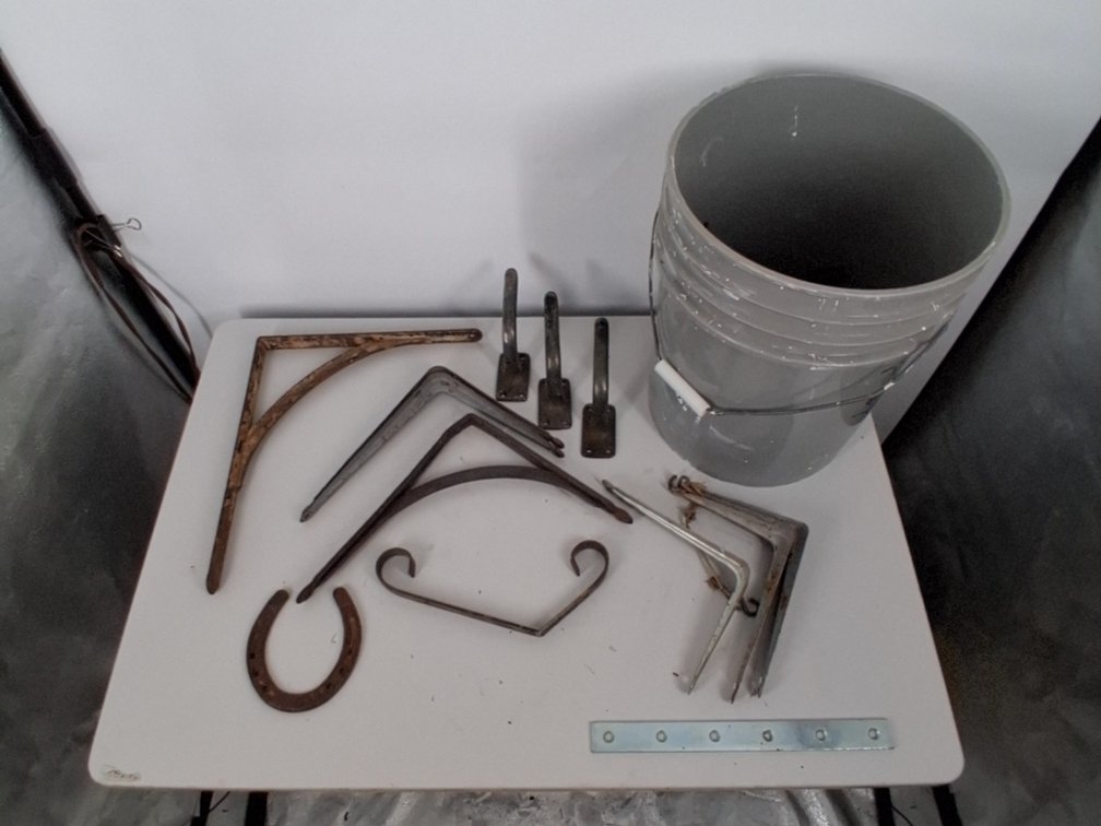 5 gallon bucket of metal angle brackets,
