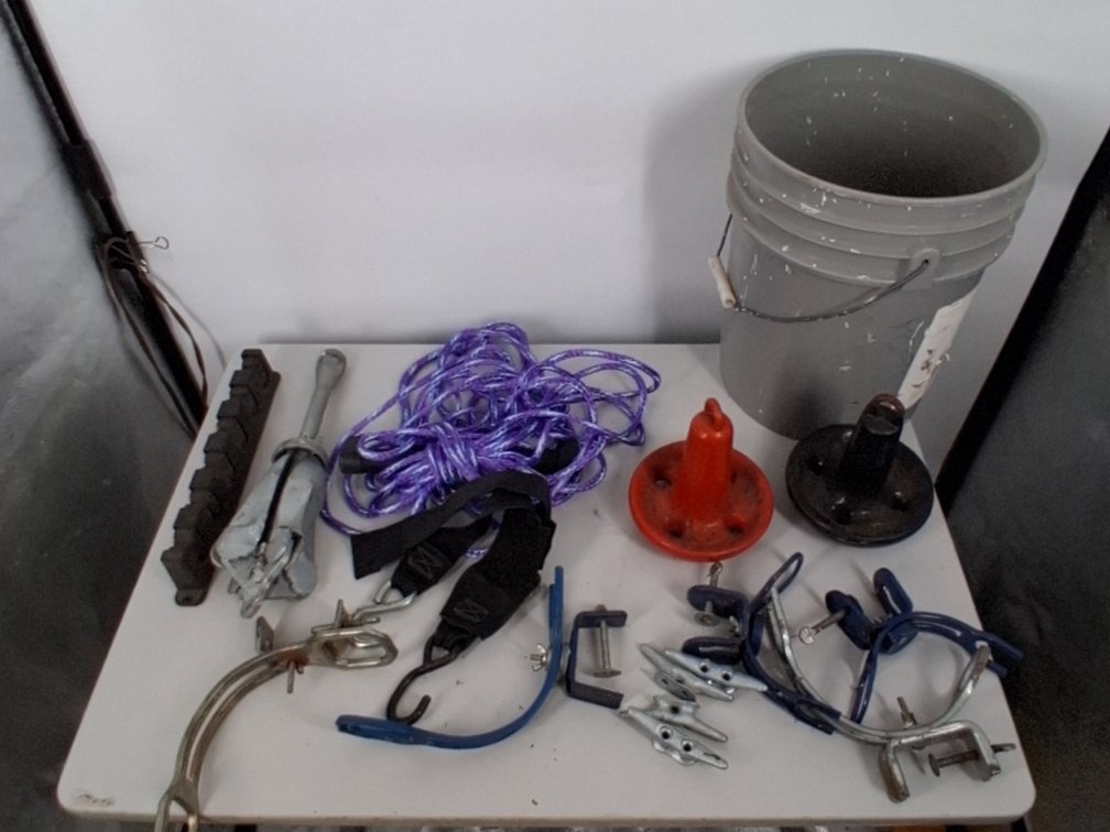 5 gallon bucket of water ski rope, rod