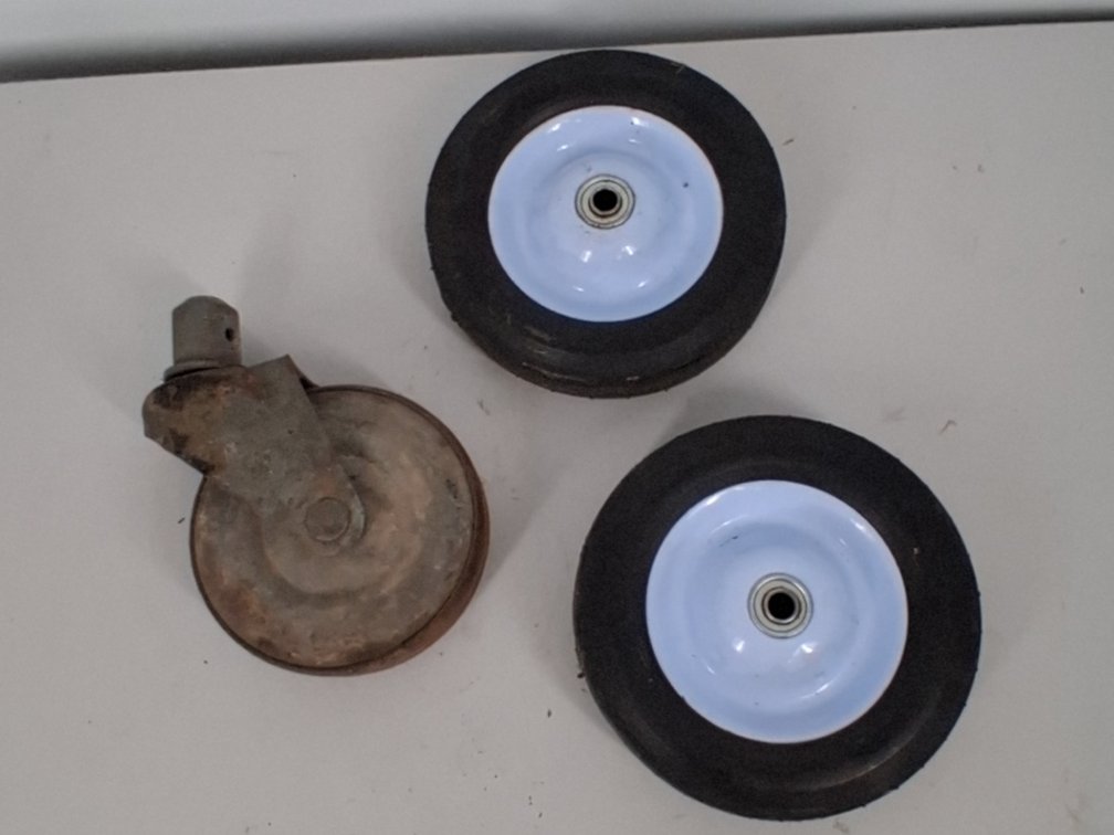 large caster wheel and 2 wagon wheels